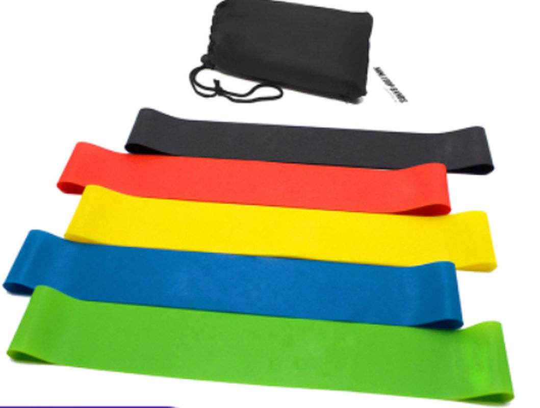 Set of five colorful Yoga Fitness Rally resistance bands with a black carrying pouch, made of durable latex for multi-level strength training.