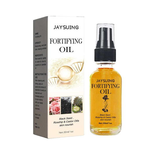 Facial moisturizing essential oil bottle and box with black seed, rosehip, and castor oils for hydrating and firming skin