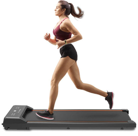 Woman running on a black portable Walking Pad under Desk Treadmill with LED display and remote control